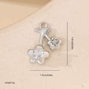 Macro detail of cherry flower pendant with heart cubic zirconia and size dimensions