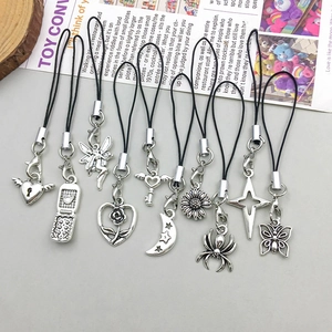 Vintage silver alloy charms set including spider and moon designs with black lanyards