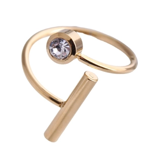 Gold plated stainless steel open ring featuring a crystal inlay in a minimalist design