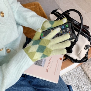 Green argyle knit touchscreen gloves for women featuring warm fleece lining for winter use
