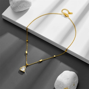 Minimalist gold heart crystal necklace with small geometric block accents for women