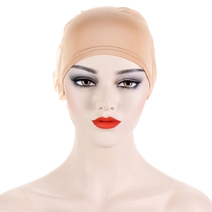 Women's light khaki turban hat with rose applique and rhinestones on a white background