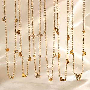 Gold plated stainless steel necklaces featuring butterfly, heart, and star pendants with pavé