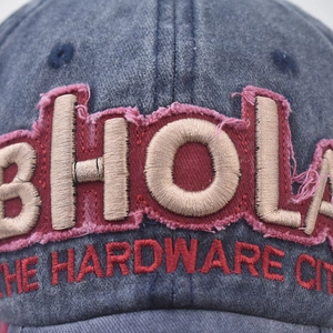 Navy blue washed denim baseball cap with 3D BHOLA embroidery and vintage patch