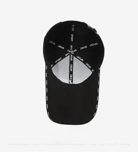 Detail view of the breathable inner lining and reinforced stitching on this black sport cap