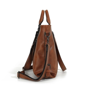 Brown faux leather tote bag with pebble texture and detachable strap on white background