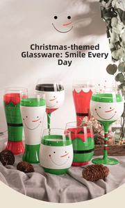 Detail of Christmas themed glassware featuring hand-painted snowman faces and holiday patterns