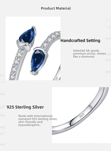 Close-up of S925 sterling silver snake ring with hand-set blue pear-cut zircon