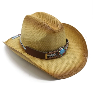 Classic straw cowboy hat with turquoise metal emblem and colorful bohemian woven band