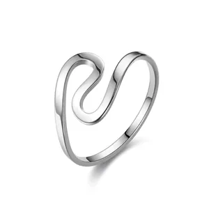 Elegant wavy curved stainless steel ring for women in a minimalist polished silver finish