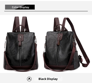Detail view of black PU leather backpack with burgundy straps and vertical zipper pocket