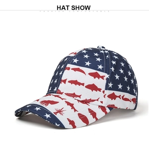 Detail of baseball cap with American star pattern and red fish print on canvas fabric