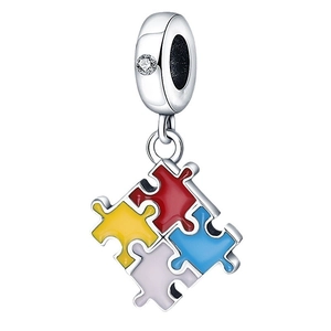 Colorful enamel puzzle piece charm in silver plating with sparkling clear zircon inlay