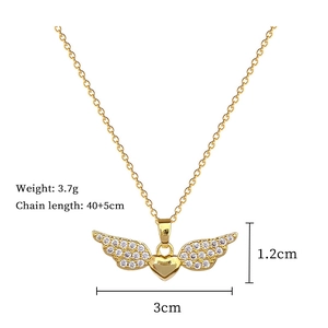 Detail view of heart with wings necklace showing 3cm size and 40cm chain length