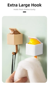 Cute cartoon gravity hooks showing brown bear and yellow chick on a green wall