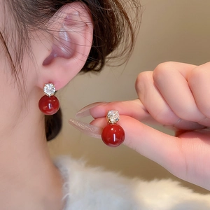 Vintage style gold earrings with red round pearls and sparkling zircon stones for women