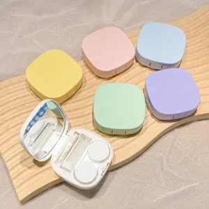 Portable macaron color contact lens case set with mirror, tweezers and solution bottle