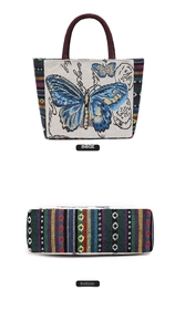 Detail view showing back and flat bottom of ethnic tote bag with butterfly embroidery