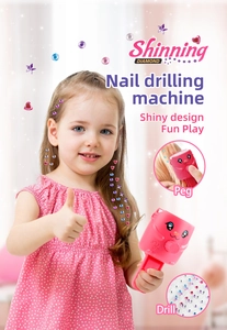 Macro detail of pink cat-shaped hair gem stamper tool with colorful adhesive rhinestones