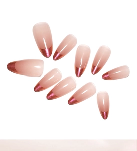 Detail of rose red french tips on 10pc nude almond shaped press-on nails set