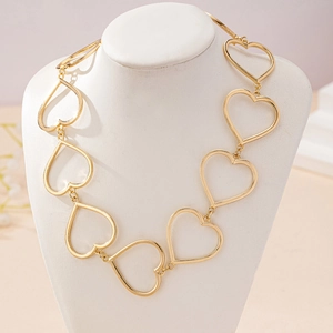 Elegant gold-plated cutout heart chain necklace for women displayed on a white bust model