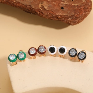 Elegant round stud earrings with colorful crystals and gold plating on stone base