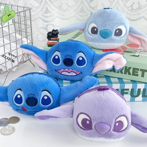 Group of plush Stitch coin purses in blue and purple hues with zip and soft texture