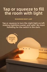 Close-up of mushroom silicone night light on desk showing warm yellow glow and touch sensor