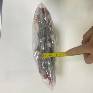 Pack of 4 Christmas ornaments set in red and grey fabric, measuring about 4cm thickness