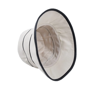Minimalist beige PU leather bucket hat with black trim and wide brim sun protection