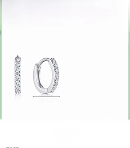 Detail view of 925 sterling silver hoop earrings with cubic zirconia and 1.3cm size
