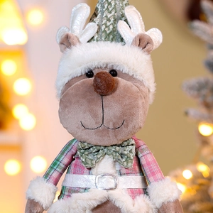 Close-up of plush Christmas reindeer doll with telescopic legs and green knitted hat