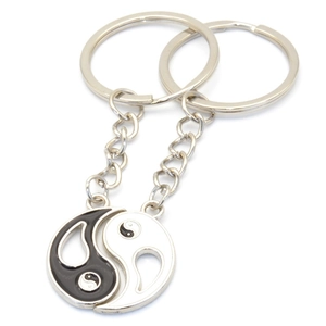 Yin Yang metal keychain set in black and white enamel for couples and best friends
