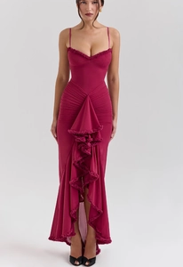 Detail of burgundy V-neck fishtail maxi dress with layered ruffles and elegant pleats