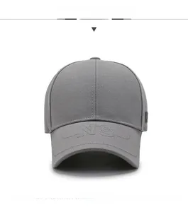 Detailed view of dark grey baseball cap featuring NS embroidery and breathable fabric