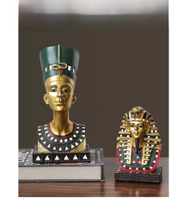 Detailed resin sculptures of Queen Nefertiti and Pharaon Sphinx in vintage gold finish