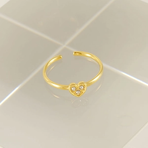 Minimalist gold heart-shaped adjustable ring featuring three sparkling white zircon stones