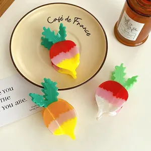 Handmade carrot-shaped acetate hair claw clips in vibrant gradient colors for women