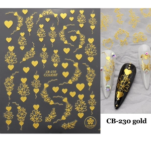 Detail showing 3D gold heart and rose nail stickers applied on various nail polish colors