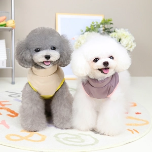 Thickened winter pet puffer vest for small dogs featuring high collar and stylish patchwork
