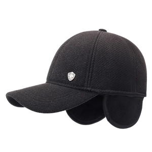 Winter men's fleece baseball cap in black with fold-down ear flaps and fashion metal badge
