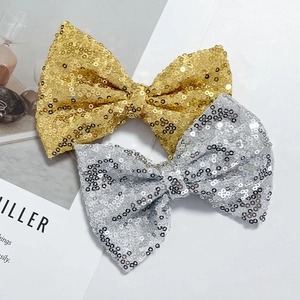 Sparkly gold and silver sequin bows for girls hair accessories and clothing decor