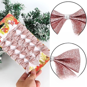 Set of 12 rose gold glitter Christmas tree bows for holiday party decorations