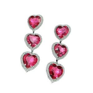 Pink heart-shaped triple drop earrings with sparkling rhinestones in a silver setting