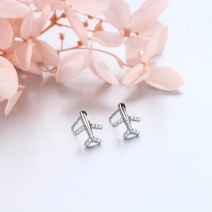 Sparkling S925 sterling silver airplane stud earrings with white zircon accents