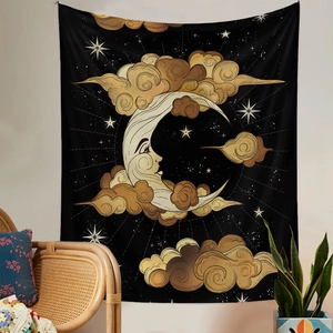 Detail of mystical black tapestry with golden moon, clouds, and stars for wall decor
