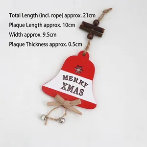 Red and white wooden Christmas bell ornament with Merry Xmas cutouts and silver bells