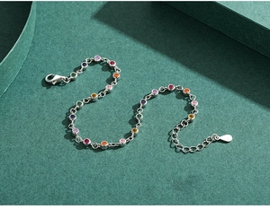 Detail of S925 silver bracelet with colorful cubic zirconia and lobster clasp with extension