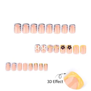 French zebra print press-on nails with 3D white bows, yellow edges, and rhinestones