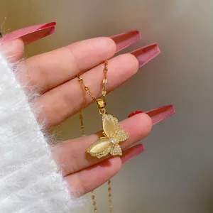 Luxury butterfly necklace in titanium steel with yellow cat-eye stone and crystal accents